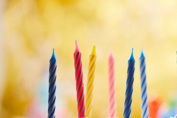 birthday candles on the yellow - 775717487