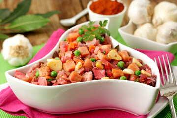 Sautéed vegetables with ham.