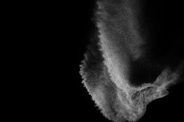 Abstract dust overlay texture. Motion of white particles on black background. Powder explosion.	
