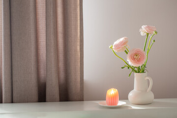 spring flowers in vase in white modern interior