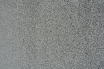 Background - wall with coarse gray roughcast finish