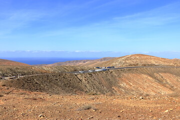 Mirador astronomico Sicasumbre, Fuerteventura, Spain - November 23 2023: People enjoy the view of the desert hills