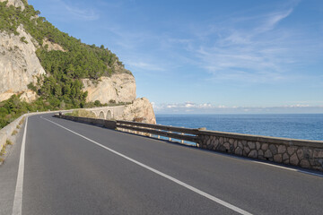 The stunning high altitude cliffside road along the coastline of Liguria, Italy - 775739495