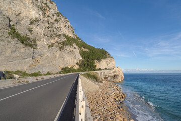 The stunning high altitude cliffside road along the coastline of Liguria, Italy - 775739663