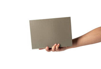 Blank grey book cover in hand on transparent background.