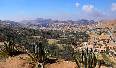 A high angle view of the mountainous landscape around Petra, Jordan. 