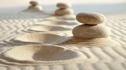 Fotobehang Zen stones set against the pristine canvas of white sand, their arrangement inviting tranquility through mindful patterns © Aonin