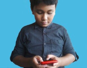 close up boy using hand phone