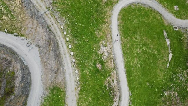Steep gravel path leading up to Himakona (The little Trolltunga) in Nedstrand, Norway, 4K drone.