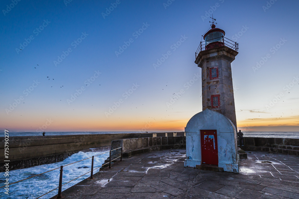 Wall mural Felgueiras Lighthouse in Foz do Douro area during evening in Porto, Portugal