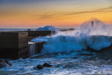 Atlantic Ocean waves seen from Foz do Douro area during evening in Porto city, Portugal