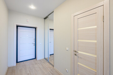 standard room interior apartment. room doors, renovation corridor lobby entrance hall