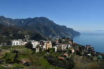 Beautiful view of the Amalfi coast in the province of Salerno, Italy under a bright blue sky