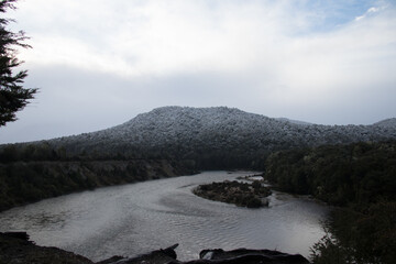 Snow over lake from high viewpoint
