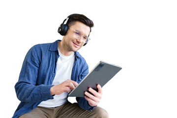 A male student studying online education uses a tablet. Isolated transparent background.