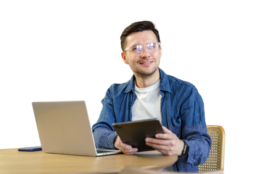 A male student studying online education uses a laptop and tablet. Isolated transparent background.