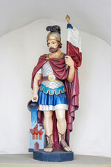 CZARNY DUNAJEC, POLAND - MARCH 29, 2024: Figure of Saint Florian at the church in Czarny Dunajec,...