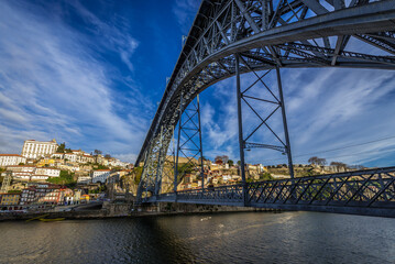 Fototapeta premium Porto city and Dom Luis I Bridge over Douro River seen from Vila Nova de Gaia, Portugal
