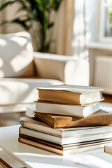Close-up of books in a modern apartment interior in white and beige colors