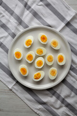 Cooked Hard Boiled Eggs on a Plate, top view.