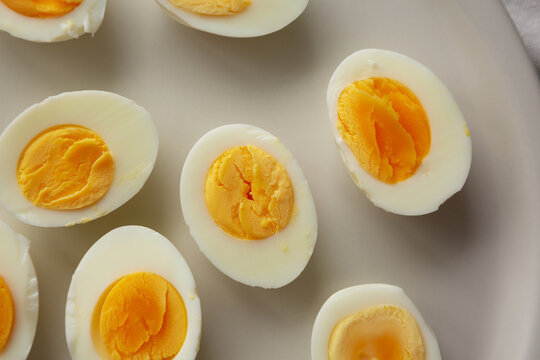 Cooked Hard Boiled Eggs on a Plate, top view. Close-up.