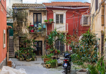 Residential buildings on Ortygia island, old part of Syracuse city, Sicily Island, Italy
