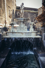 Amenano Fountain in historic part of Catania city, Sicily Island, Italy