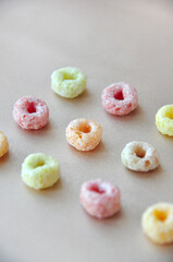 Row of Colorful Fruit Loops Cereal with Copy Space