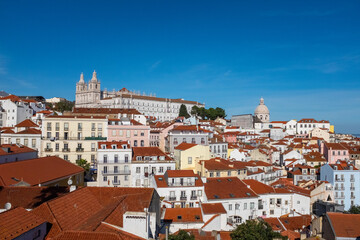 Fototapeta na wymiar Monastery of São Vicente de Fora in the distance with blue sky in Lisbon Portugal