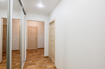 standard room interior apartment. room doors, renovation corridor lobby entrance hall