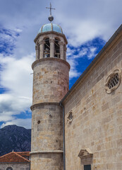 Tower of church on Our Lady of the Rocks small islet near Perast town, Montenegro