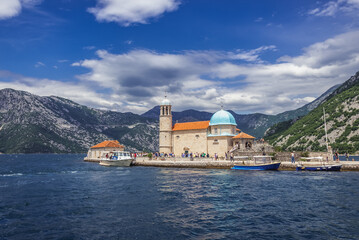 Distance view of Our Lady of the Rocks islet near Perast town, Montenegro