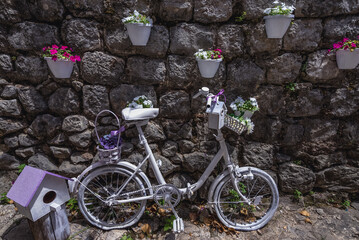 Decorative bicycle in front of hostel in Perast old town, Bay of Kotor, Montenegro