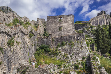 Fototapeta na wymiar Ruins of Fortress of St John above Kotor Old Town, Montenegro