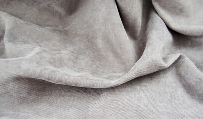 Background from a grey perfect suede fabric. Velvet texture.
