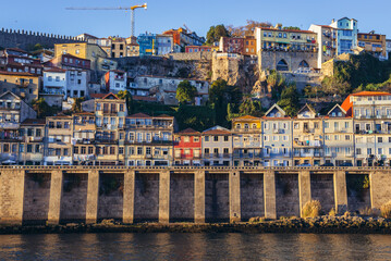 Fototapeta na wymiar Houses over the Douro River in Se district of Porto, Portugal