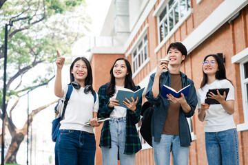 Fototapeta premium Diverse group of young adults from Asia and beyond, enjoying university life together. happy, learning, and making lifelong friendships, whether in outside class, sunny summer days or cozy weekends