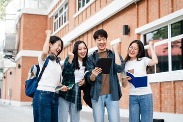 Diverse group of young adults from Asia and beyond, enjoying university life together. happy,...