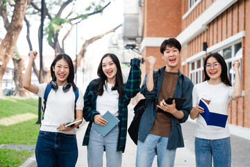 Diverse group of young adults from Asia and beyond, enjoying university life together. happy,...