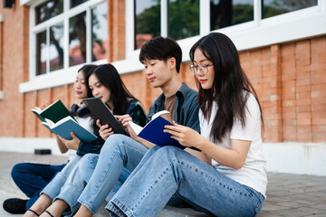 Diverse group of young adults from Asia and beyond, enjoying university life together. happy,...