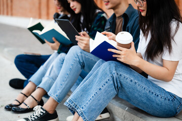 Diverse group of young adults from Asia and beyond, enjoying university life together. happy,...