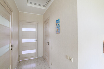 standard room interior apartment. room doors, renovation corridor lobby entrance hall