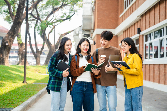 Diverse group of young adults from Asia and beyond, enjoying university life together. happy, learning, and making lifelong friendships, whether in outside class, sunny summer days or cozy weekends