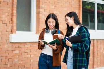 Diverse group of young adults from Asia and beyond, enjoying university life together. happy,...