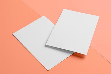 Two pieces of blank Us letter paper on peach background. Stationery, resume or cover letter mockup.