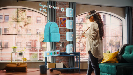 Black Woman Using Virtual Reality Headset for Online Shopping, Browsing through Stylish Handbags...