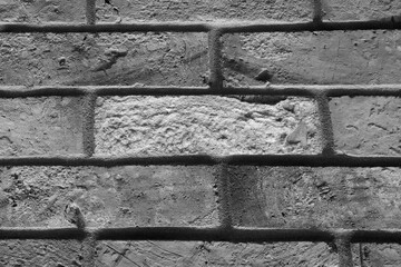 Black and White Photo of a Brick Wall