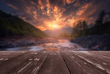 Foto op Aluminium Fast mountain river flowing with empty wooden batten bridge. Natural template landscape © soso