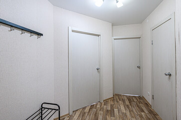 standard room interior apartment. room doors, renovation corridor lobby entrance hall