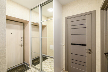 standard room interior apartment. room doors, renovation corridor lobby entrance hall